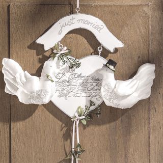 Decorative sign with sewn doves