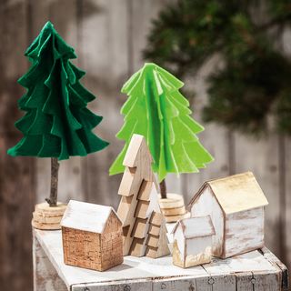 Felt tree forest with little house and wooden fir trio