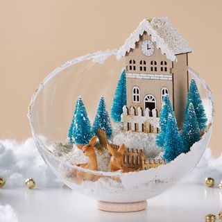 Dreamlike winter landscape with house