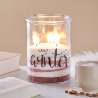 Candle sand in a glass