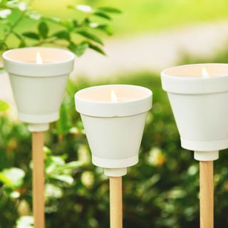 Garden candles with terracotta and Raysin
