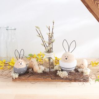 Wooden board with Easter decoration